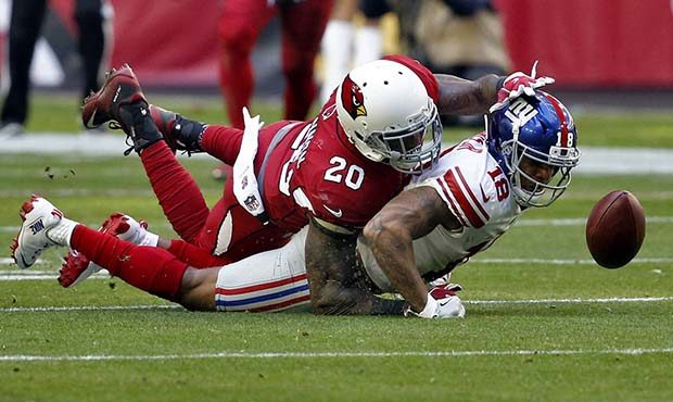 Arizona Cardinals inside linebacker Deone Bucannon (20) forces New York Giants wide receiver Roger ...