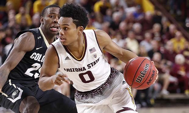 Arizona State guard Tra Holder (0) drives past Colorado guard McKinley Wright IV during the second ...