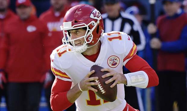 FILE - In this Nov. 19, 2017, file photo, Kansas City Chiefs quarterback Alex Smith (11) looks to p...