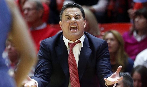 Arizona head coach Sean Miller shouts to his team in the second half during an NCAA college basketb...