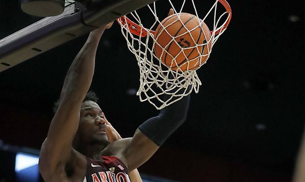 Arizona forward Deandre Ayton (13) dunks against Stanford center Josh Sharma (20) during the first ...