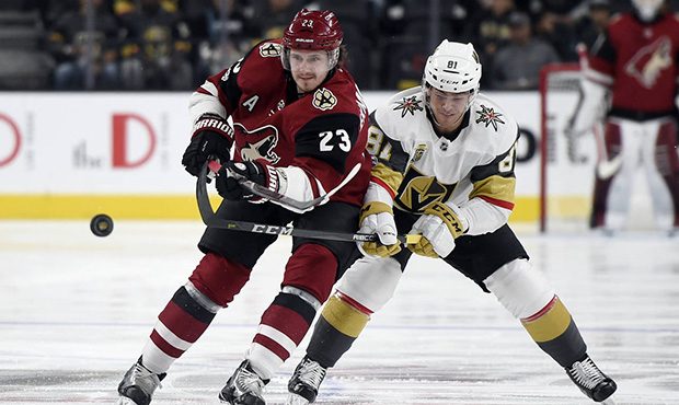 Arizona Coyotes defenseman Oliver Ekman-Larsson (23) and Vegas Golden Knights center Jonathan March...