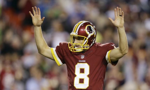 Washington Redskins quarterback Kirk Cousins (8) reacts to wide receiver Andre Roberts' touchdown d...