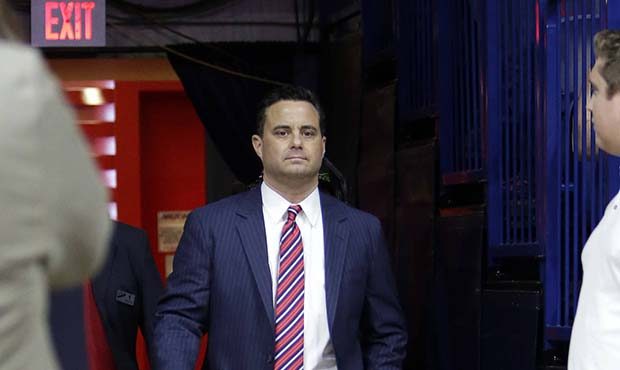 Arizona coach Sean Miller walks onto the court before the team's NCAA college basketball game again...