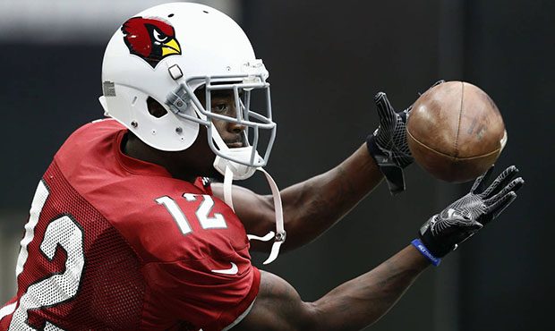 FILE - In this Aug. 17, 2017, file photo, Arizona Cardinals wide receiver John Brown (12) makes a c...