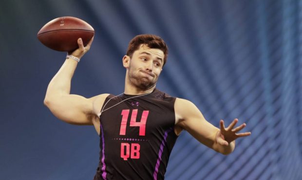 Oklahoma quarterback Baker Mayfield throws during a drill at the NFL football scouting combine in I...