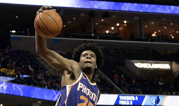 Phoenix Suns forward Josh Jackson (20) prepares to shoot against Memphis Grizzlies forward Jarell M...