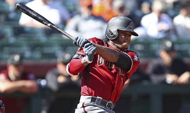 Arizona Diamondbacks' Ketel Marte swings for an RBI triple off San Francisco Giants' Jeff Samardzij...