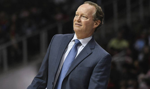 Atlanta Hawks coach Mike Budenholzer watches a three point try during the second half of an NBA bas...