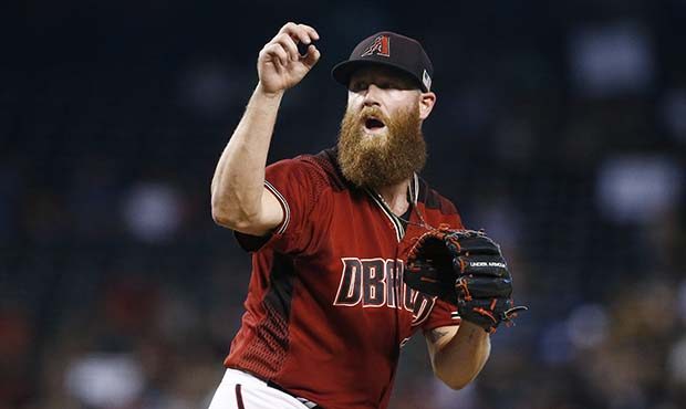 Arizona Diamondbacks' Archie Bradley follows through on a pitch against the San Diego Padres during...