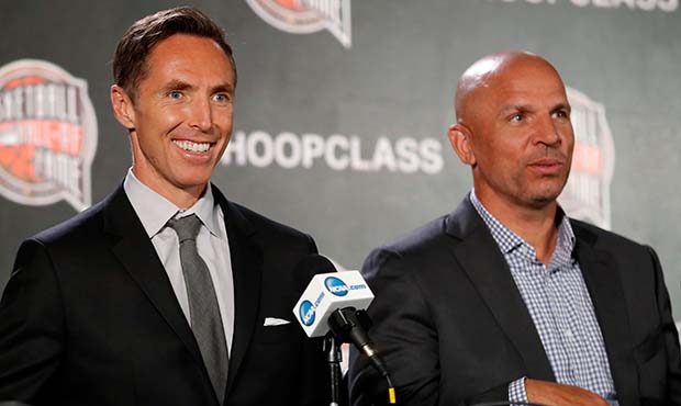 Former NBA player Steve Nash, left, smiles as former NBA player Jason Kidd, right, looks on during ...