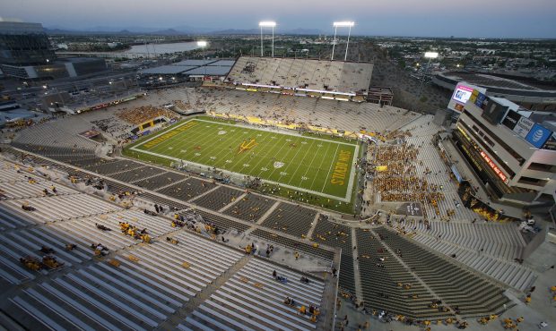 Some of the newly finished stadium construction, foreground, at Sun Devil Stadium starts to fill up...