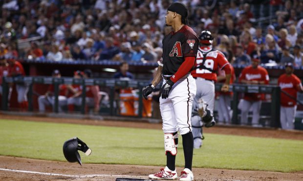 Arizona Diamondbacks shortstop Ketel Marte throws his helmet down after striking out against the Wa...