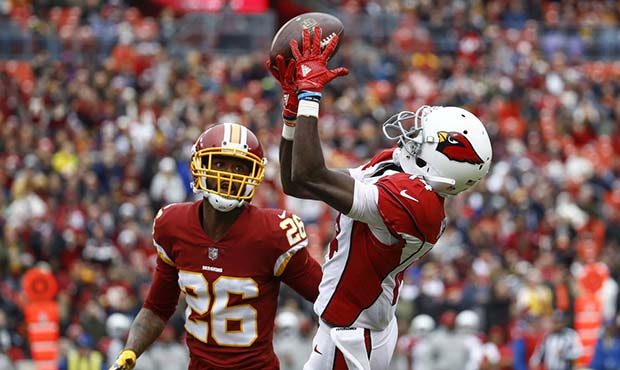 Arizona Cardinals wide receiver J.J. Nelson (14) pulls in a pass as Washington Redskins cornerback ...