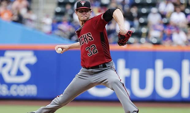 Arizona Diamondbacks' Clay Buchholz delivers a pitch during the first inning of a baseball game aga...