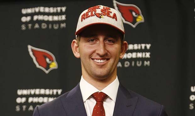 Arizona Cardinals first-round NFL football draft pick Josh Rosen poses for a photograph after a new...