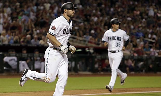 Arizona Diamondbacks Paul Goldschmidt heads to first on a bases-loaded walk that allowed John Ryan ...
