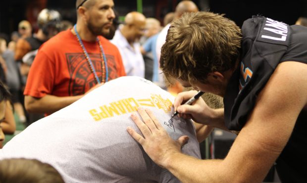Linebacker Ryan Langford is one of many Rattlers players signing autographs after the last home gam...