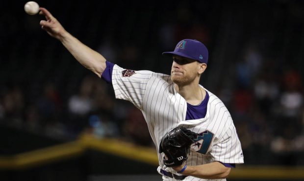 Arizona Diamondbacks starting pitcher Matt Koch throws to a New York Mets batter during the first i...
