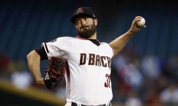 Arizona Diamondbacks starting pitcher Robbie Ray throws to a San Francisco Giants batter during the...