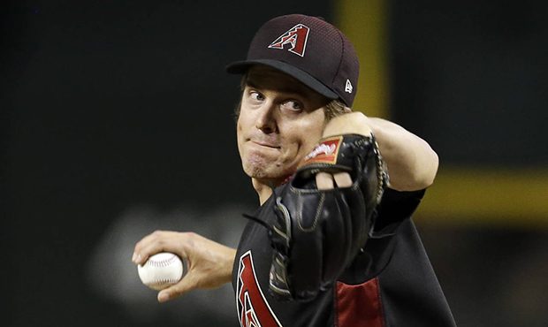 Arizona Diamondbacks pitcher Zack Greinke throws in the first inning during a baseball game against...