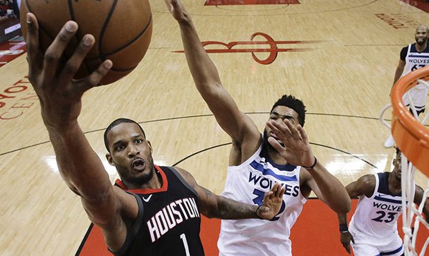 Houston Rockets forward Trevor Ariza (1) drives to the basket as Minnesota Timberwolves center Karl...