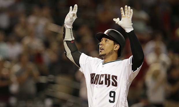 Arizona Diamondbacks' Jon Jay reacts after hitting a three-run home run against the Pittsburgh Pira...