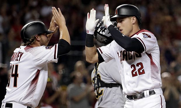 Arizona Diamondbacks' Jake Lamb (22) celebrates his three-run home run against the Pittsburgh Pirat...