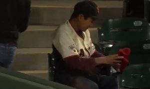Falling D-backs fan is actually switching jerseys, hats to get baseballs