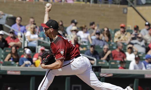 Arizona Diamondbacks' Shelby Miller throws during the first inning of a spring training baseball ga...