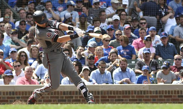 Arizona Diamondbacks' Nick Ahmed hits a grand slam during the fifth inning of a baseball game  agai...