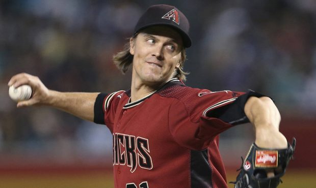 Arizona Diamondbacks starting pitcher Zack Greinke throws against the Colorado Rockies during the f...