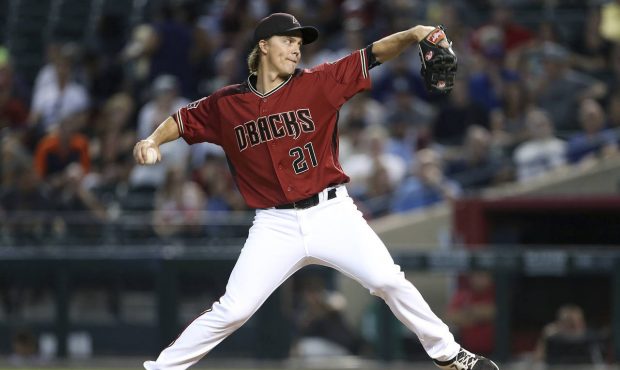 Arizona Diamondbacks starting pitcher Zack Greinke throws against the Colorado Rockies during the f...