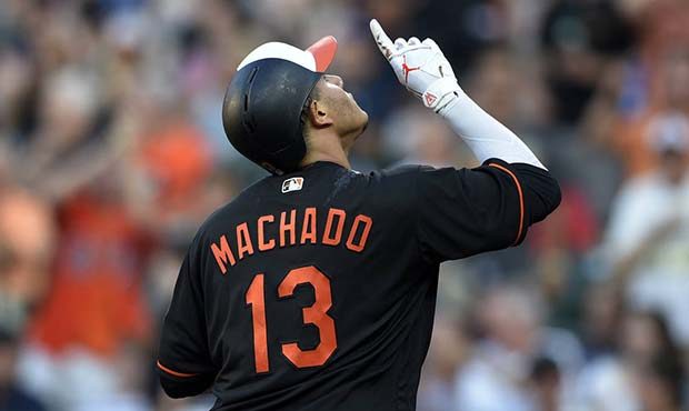 Baltimore Orioles' Manny Machado celebrates his home run during the first inning of a baseball game...