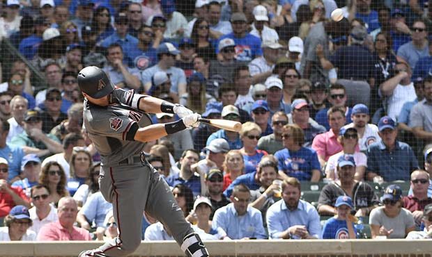 Arizona Diamondbacks' Nick Ahmed hits a grand slam during the fifth inning of a baseball game  agai...