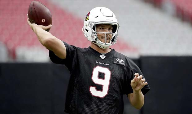 Arizona Cardinals quarterback Sam Bradford (9) throws during the first day of NFL football training...