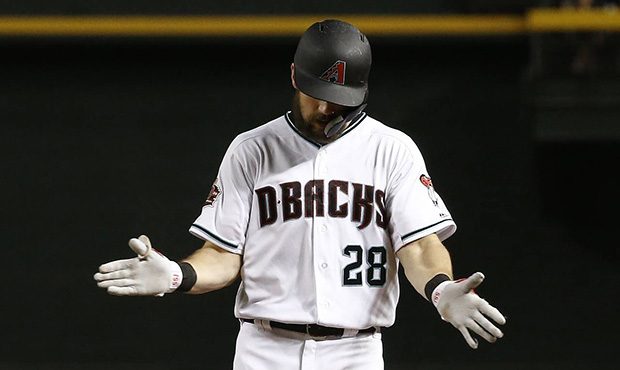 Arizona Diamondbacks' Steven Souza Jr. claps after his RBI single against the San Diego Padres duri...