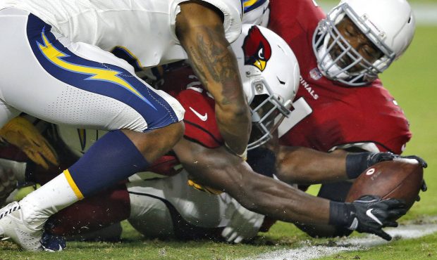 Arizona Cardinals running back Chase Edmonds stretches the football across the goal line for a touc...