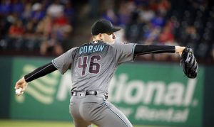 Goldschmidt homers, Corbin sharp in D-backs' win against Rangers