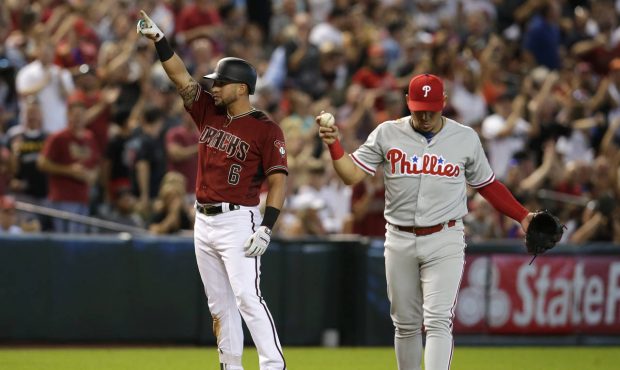 Arizona Diamondbacks' David Peralta (6) celebrates after hitting an RBI triple against the Philadel...