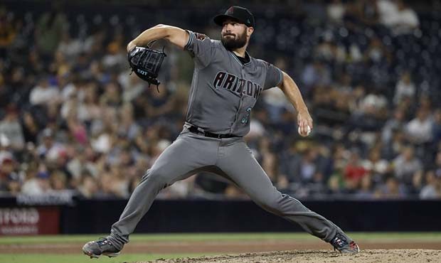 Arizona Diamondbacks starting pitcher Robbie Ray works against a San Diego Padres batter during the...