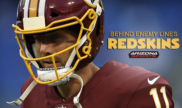 Washington Redskins quarterback Alex Smith warms up before a preseason NFL football game against th...