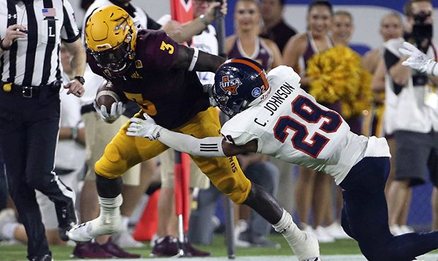Arizona State running back Eno Benjamin (3) tries to elude the tackle of UTSA defensive back Clayto...