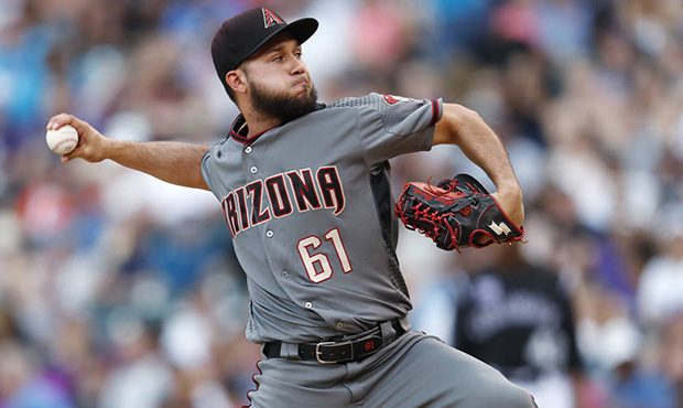 Arizona Diamondbacks relief pitcher Silvino Bracho throws to a Colorado Rockies batter during the s...