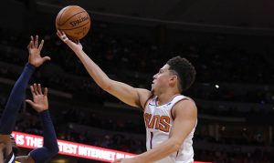 Phoenix Suns guard Devin Booker gives jersey to young fan in Denver