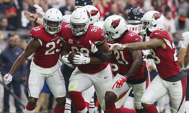 Arizona Cardinals defensive tackle Corey Peters (98) celebrates his fumble recovery against the Chi...