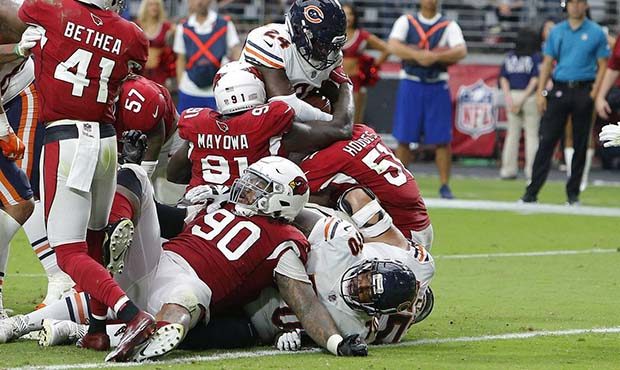 Chicago Bears running back Jordan Howard (24) scores a touchdown as he gets past Arizona Cardinals'...