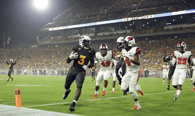 Arizona State running back Eno Benjamin (3) scores a touchdown as Oregon State cornerback Dwayne Wi...