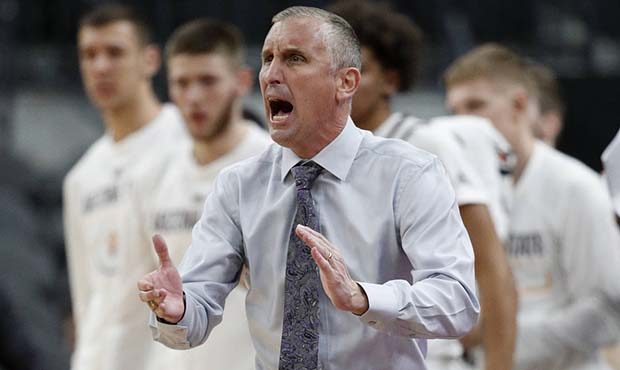 Arizona State head coach Bobby Hurley yells toward the court during the second half of an NCAA coll...