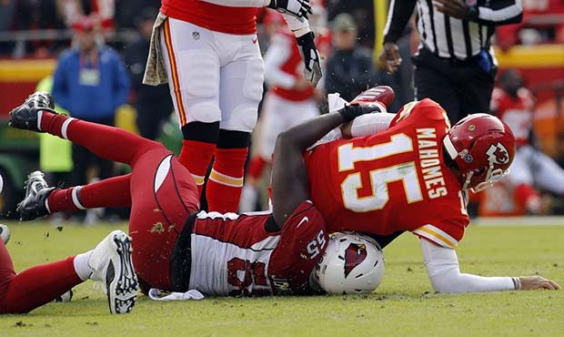Kansas City Chiefs quarterback Patrick Mahomes (15) is sacked by Arizona Cardinals defensive end Ch...